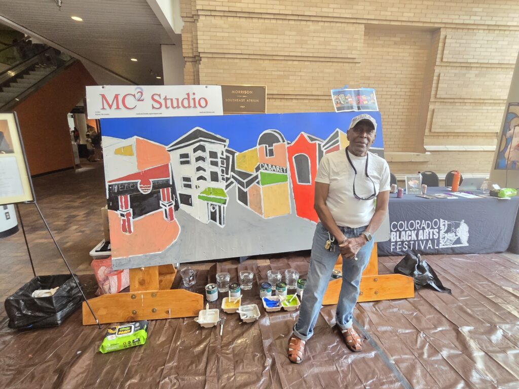 Photo of Randy with Five Points painting